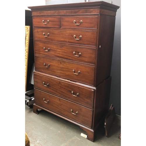 1048 - A George III mahogany chest on chest, moulded pediment over two short and three graduating drawers, ... 