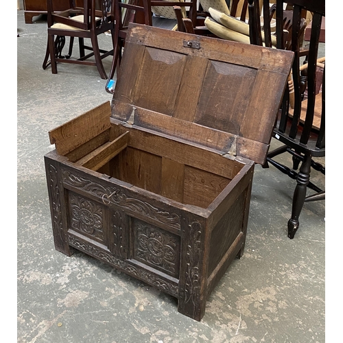 1009 - An 18th century and later two panel oak coffer, with candle box, 81x47x53cmH