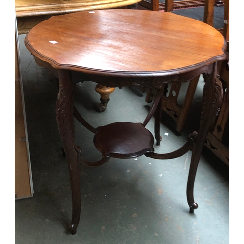 1033 - An early 20th century Liberty style octagonal occasional table with undershelf; together with a furt... 