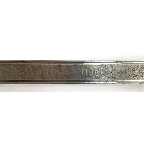 A Victorian officer’s sword, the straight blade etched with ‘Ad Finem
