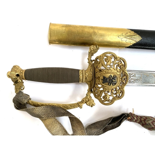 A Victorian officer’s sword, the straight blade etched with ‘Ad Finem