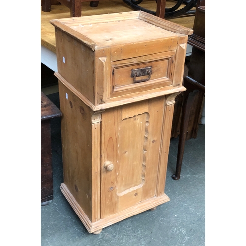 994 - A pine bedside cabinet, top apparently missing, having a single drawer over cupboard, 42x33x87cmH