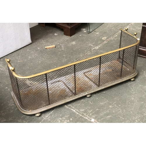 1067 - A brass and wire fender, 103cmW