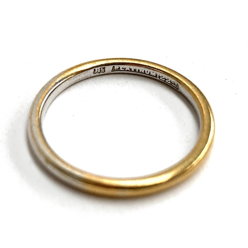 9 - A 22ct gold and platinum wedding band, size Q, 3.3g
