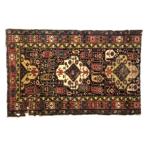 705 - A cut down colourful Persian rug, 181x114cm