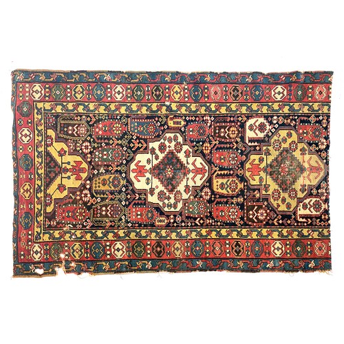 705 - A cut down colourful Persian rug, 181x114cm