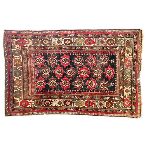 707 - An early 20th century Caucasian rug, c.1915, 178x115cm