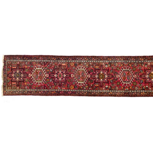 717 - A very long Gharadjeh runner rug, 480x76cm