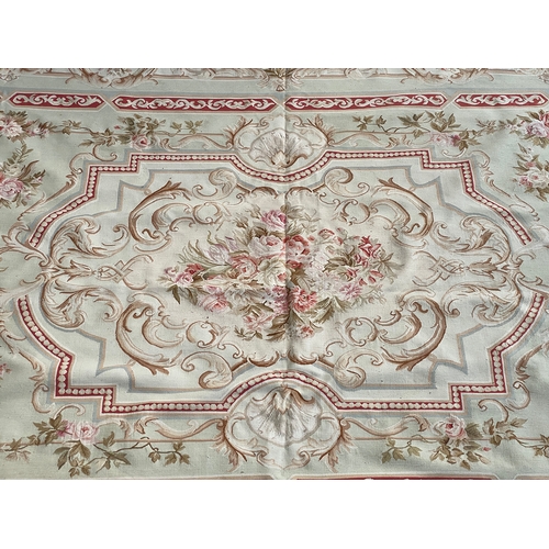 718 - A very large French Aubusson style floral rug, rose swag design, 427x300cm