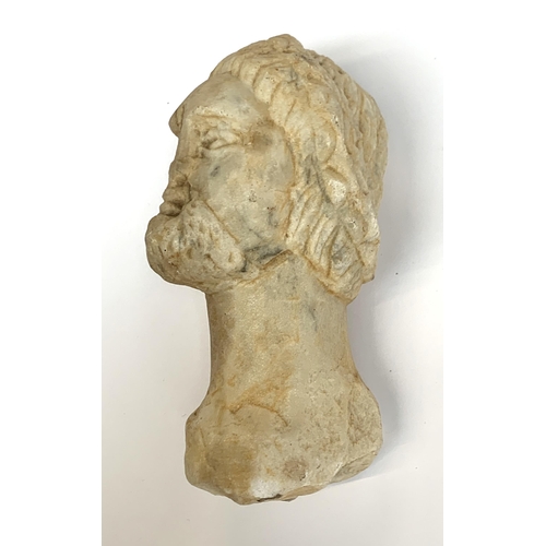 242 - A carved marble bust of a Grecian man wearing a laurel wreath, 16cm high