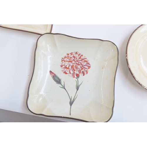 229 - A Davenport pearlware botanical dessert service, each piece hand painted with a flower within brown ... 