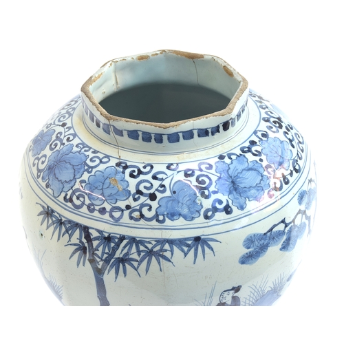 209 - An 18th century Delft vase, blue and white in the Chinese Transitional style, octagonal rim, decorat... 