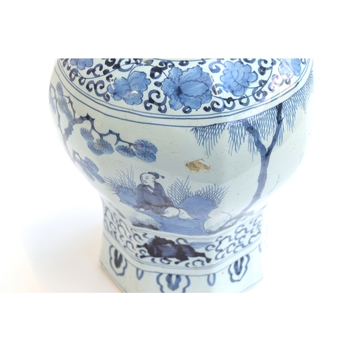 209 - An 18th century Delft vase, blue and white in the Chinese Transitional style, octagonal rim, decorat... 