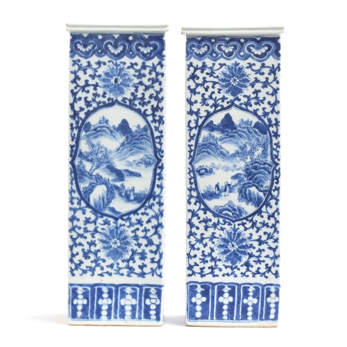 208 - A pair of tall Chinese blue and white vases of square form, each of the four sides painted with pane... 