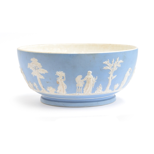 228 - A large 19th Century Wedgwood Jasperware bowl, decorated with the 'Sacrifice' scene on a pale blue g... 