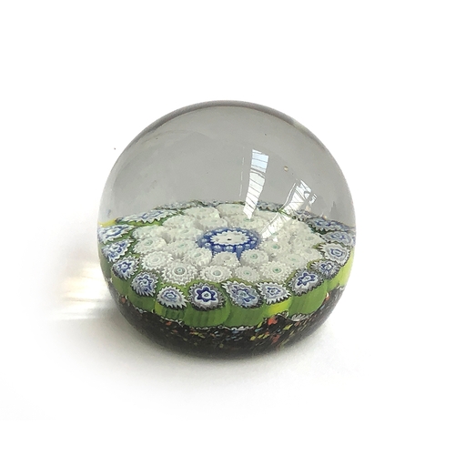 246 - A glass millefiori paperweight, 6.5cm diameter