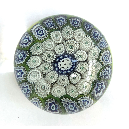 246 - A glass millefiori paperweight, 6.5cm diameter