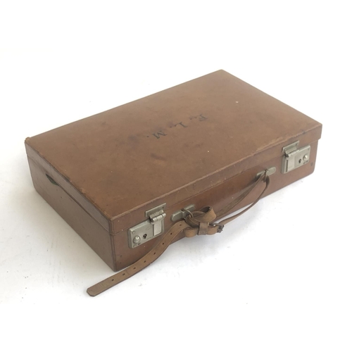 365 - A gent's brown leather overnight or attache case, green morocco interior with document wallets, 36cm... 