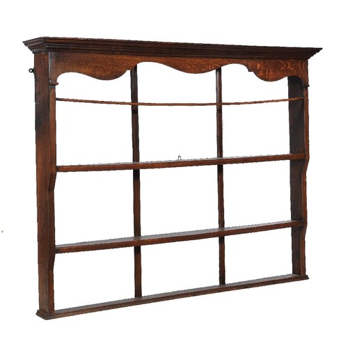 1004 - An oak hanging plate or dresser rack, 19th century, 128cm high, 180cm wide