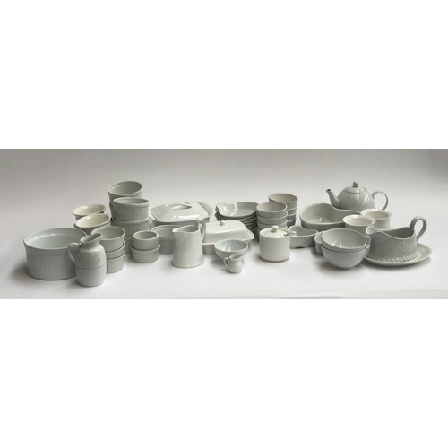 111 - A mixed lot of white ceramic ramekins and other items, to include Pillivuyt, Apilco, Arabia, Royal W... 