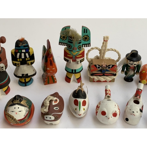 294 - Japanese ceramic zodiac whistles; ceramic bells; South American painted wooden figures inc. Mudherd ... 