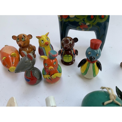 294 - Japanese ceramic zodiac whistles; ceramic bells; South American painted wooden figures inc. Mudherd ... 