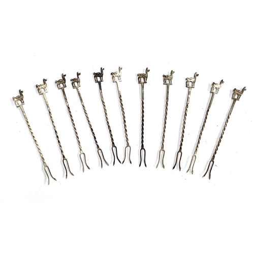 65 - A set of twelve 925 silver cocktail sticks with camel terminals, each 8.7cmL, gross weight 12.6g