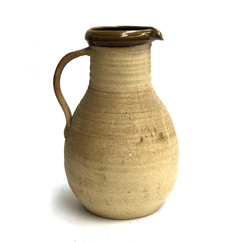 168 - A Grindon studio pottery large earthenware jug, 39cm high, signed to base