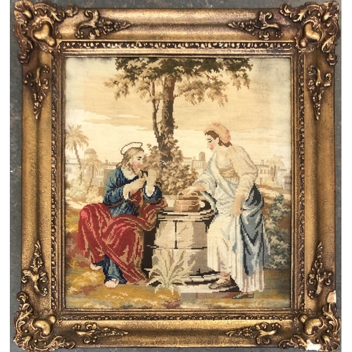 574 - A 19th century needlework picture of Jesus and the Samaritan woman, 41x37cm, in a gesso frame