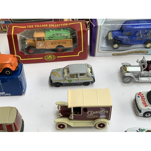 360 - A mixed lot of model cars to include Corgi tramlines, Lledo, Oxford Diecast, Matchbox, Kinsmart etc