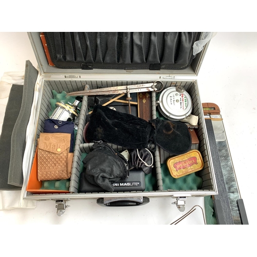 367 - An aluminium flight case containing a quantity of bowling interest tools, dividers, reels, square et... 