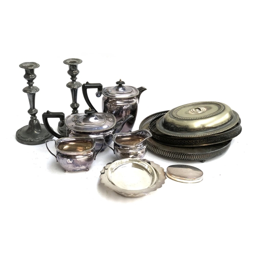 81 - A four piece tea set, a candlestick, galleried trays etc