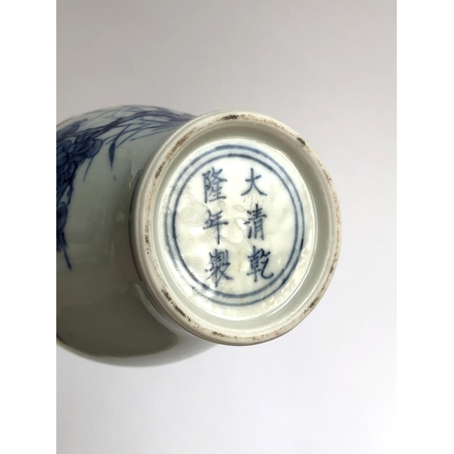 205 - A Chinese blue and white vase of baluster form, decorated with prunus design, character marks to bas... 