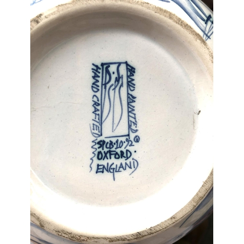 214 - Interior interest: A Deborah Sears Isis ceramics strainer bowl, hand painted with birds in a landsca... 