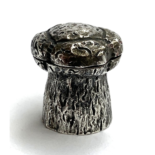 72 - A small 800 grade silver trinket pot in the form of a champagne cork, marked 'champagne' to base, 3.... 