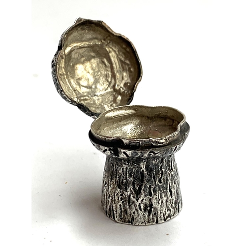 72 - A small 800 grade silver trinket pot in the form of a champagne cork, marked 'champagne' to base, 3.... 