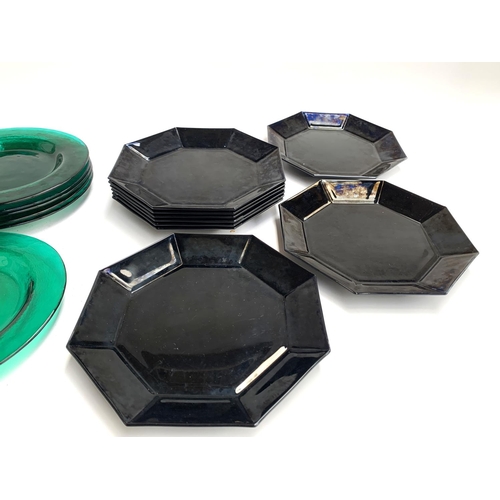 427 - Eight green glass dishes, 21cmD; together with nine French black glass octagonal plates, 22cmD