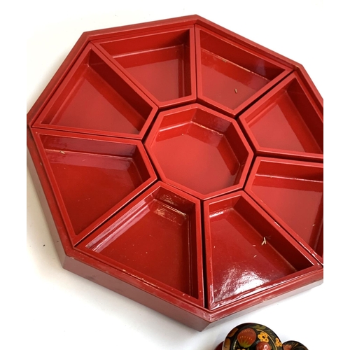 451 - A quantity of lacquered items to include a large Japanese red lacquer octagonal Bento box inlaid wit... 