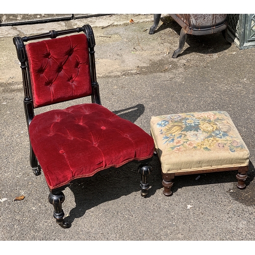 994 - An Aesthetic movement ebonised button upholstered slipper chair; together with a small footstool