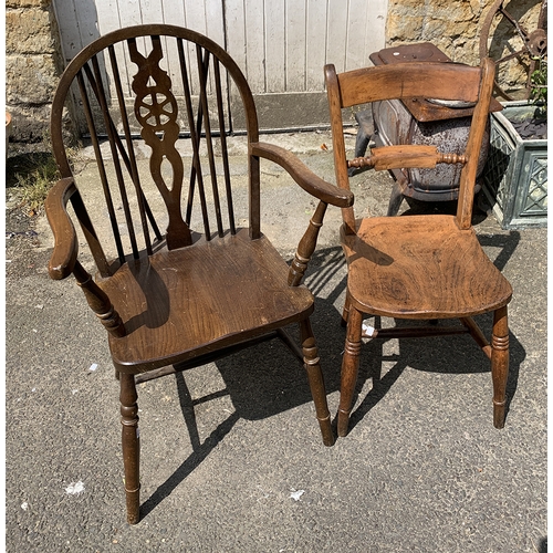 999 - A beech and elm scroll back kitchen chair, together with a 20th century wheel back Windsor armchair