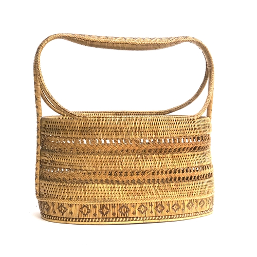 509 - A cane and bamboo basket with handle