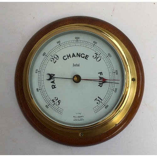 101 - A Sestrel brass marine barometer, 17cmD