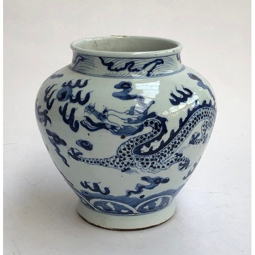 236 - A Chinese blue and white vase, decorated with a dragon amongst clouds, 18cmH