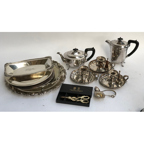 79 - A mixed lot of plated wares to include three old Sheffield Plate chamber sticks, each crested, vario... 