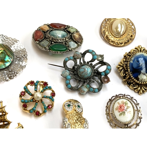 36 - A quantity of costume jewellery, mainly brooches, to include blue lace agate brooch; Limoges porcela... 