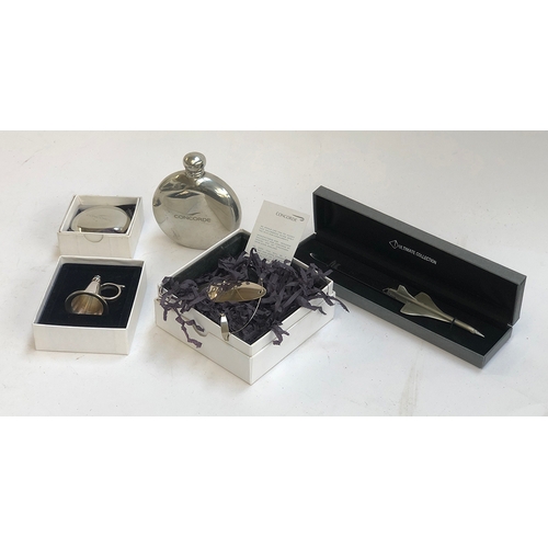 249 - Concorde interest: various Concorde branded memorabilia, to include hip flask; Port decanter label (... 