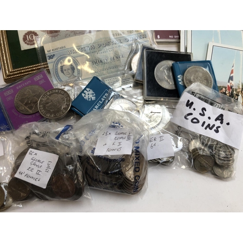 58 - COINS etc. A small quantity of pre 1947 silver coins, a framed ten shilling note; 50 pence pieces (i... 