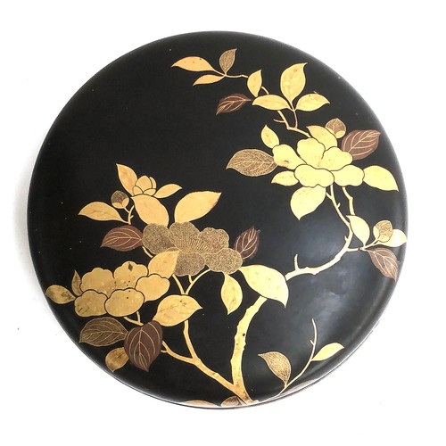 257 - An early 20th century Japanese lacquered circular lidded box with gilt decoration, 23cmD