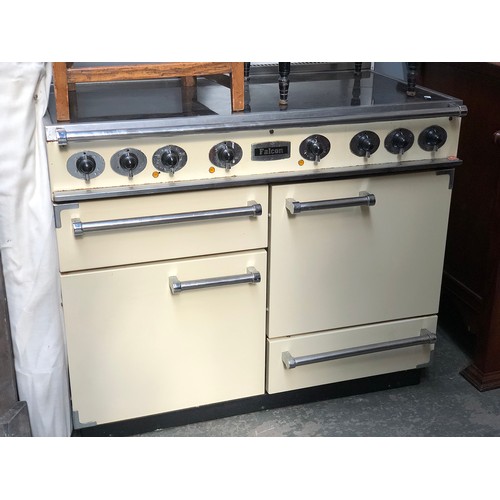 1015 - A Falcon electric range cooker, with five rings, 110cmW