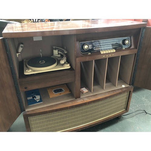 1031 - A Bush radio AC receiver serial number 327/101018, with book matched veneer, Garrard turntable, viny... 